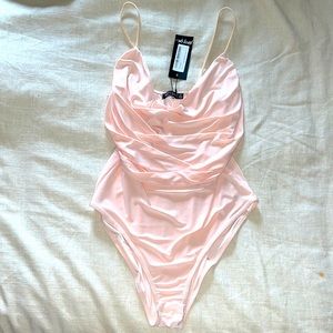 Light pink body suit